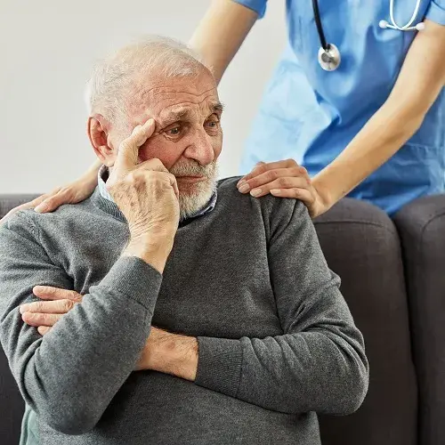 nurse doctor senior care caregiver help assistence retirement home nursing elderly sad depression alone loneliness health support family hand shoulder daughter